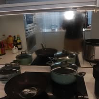 Messy kitchen counter before cleaning